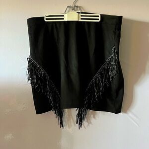 Black velvet skirt with fringe